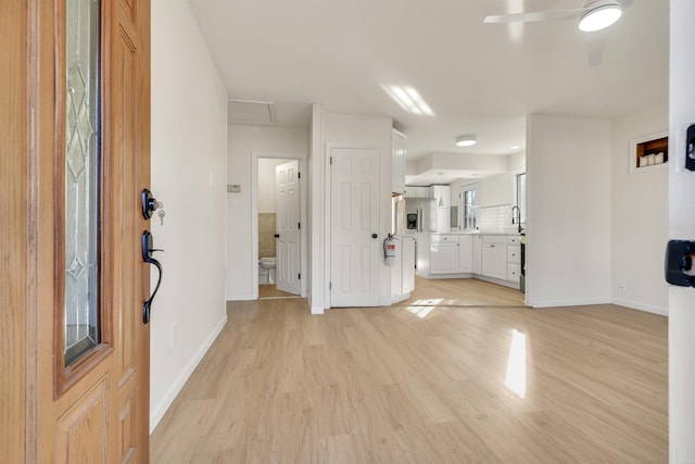 715 Eldredge Ave, North Cape May, NJ 08204 - interior space with baseboards, ceiling fan, and light wood-style floors