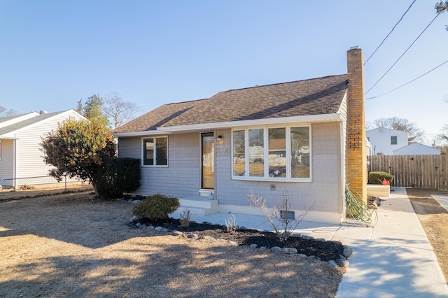 715 Eldredge Ave, North Cape May, NJ 08204 - bungalow with fence, a chimney, and a shingled roof