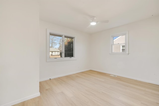 715 Eldredge Ave, North Cape May, NJ 08204 - unfurnished room with baseboards, plenty of natural light, a ceiling fan, and light wood-style flooring