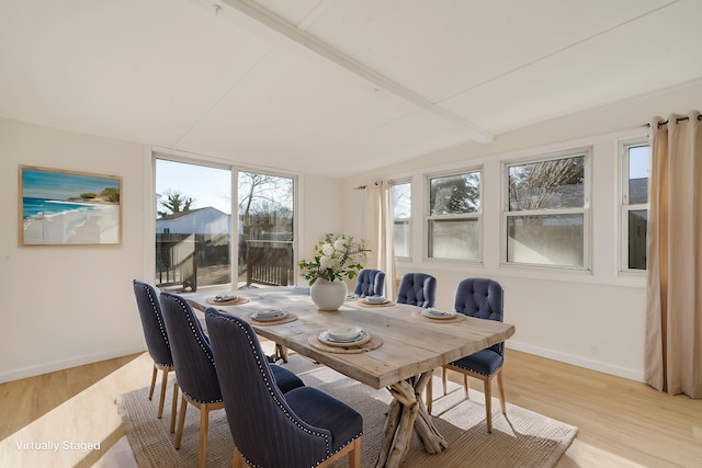 715 Eldredge Ave, North Cape May, NJ 08204 - dining space with baseboards, vaulted ceiling with beams, and light wood-type flooring