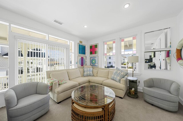 127 34th St, Avalon, NJ 08202 - living room with plenty of natural light, carpet floors, and recessed lighting