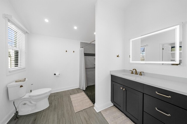 127 34th St, Avalon, NJ 08202 - bathroom with toilet, vanity, wood finished floors, curtained shower, and baseboards
