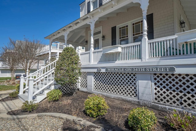 127 34th St, Avalon, NJ 08202 - view of side of home with a porch and stairs