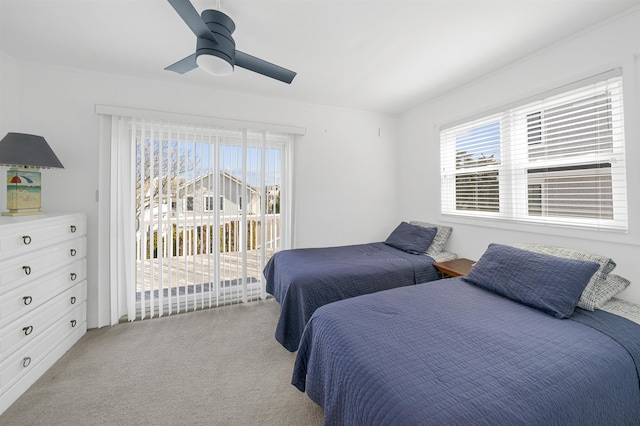 127 34th St, Avalon, NJ 08202 - bedroom with access to outside, multiple windows, light colored carpet, and ceiling fan