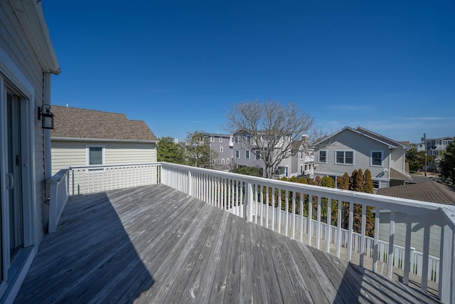 127 34th St, Avalon, NJ 08202 - wooden terrace with a residential view