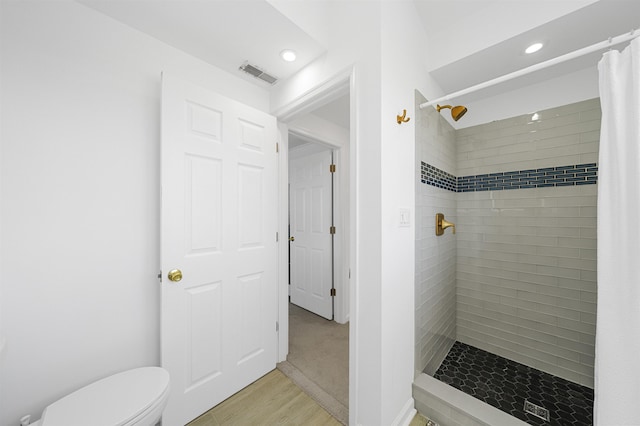 127 34th St, Avalon, NJ 08202 - bathroom with a shower stall, recessed lighting, toilet, and wood finished floors