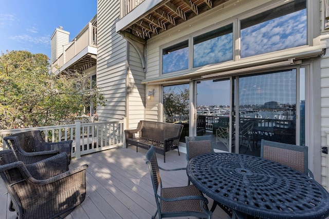 wooden deck with an outdoor hangout area