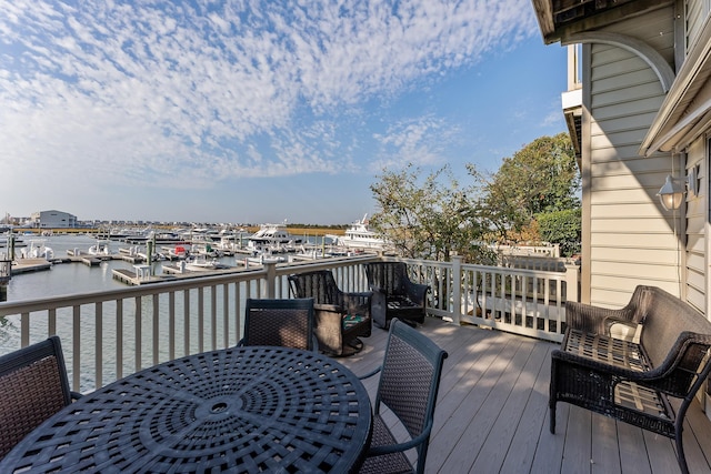 41 Marine Way Unit 41, Avalon, NJ 08202 - wooden terrace featuring a water view, outdoor dining area, and view of marina