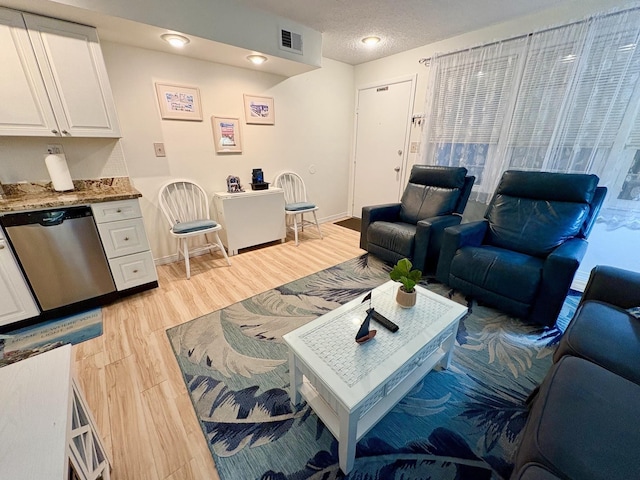 875 Plymouth Pl Unit 33, Ocean City, NJ 08226 - living area featuring light wood-style flooring and baseboards