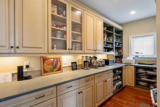 9 Seabreeze Ln, Avalon Manor, NJ 08202 - kitchen with open shelves, dark wood finished floors, glass insert cabinets, and cream cabinets