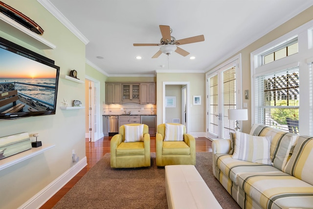 9 Seabreeze Ln, Avalon Manor, NJ 08202 - living area featuring dark wood-style floors, ceiling fan, ornamental molding, and recessed lighting