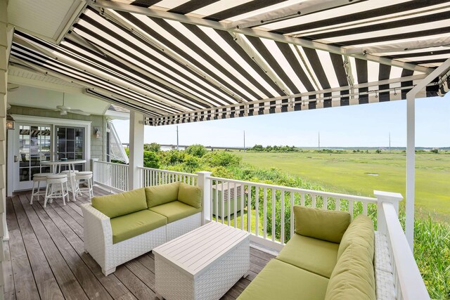 9 Seabreeze Ln, Avalon Manor, NJ 08202 - wooden terrace featuring outdoor lounge area, ceiling fan, and outdoor dining space
