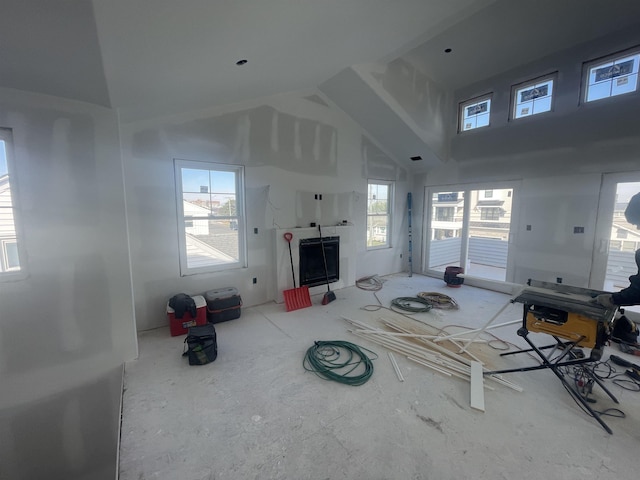 living room with a high ceiling