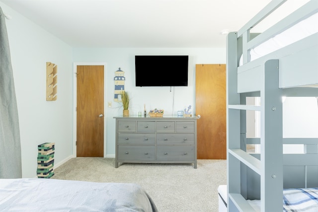 bedroom featuring carpet