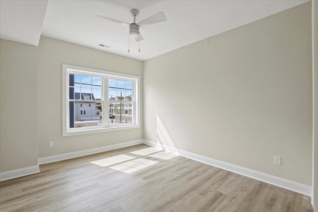 165 E Garfield Ave Unit 110, Wildwood, NJ 08260 - empty room featuring light wood-style flooring and a ceiling fan