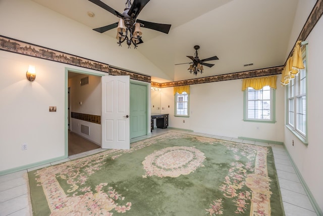 5011 Haven Ave Unit 2, Ocean City, NJ 08226 - unfurnished living room with ceiling fan, light tile patterned flooring, baseboards, and high vaulted ceiling