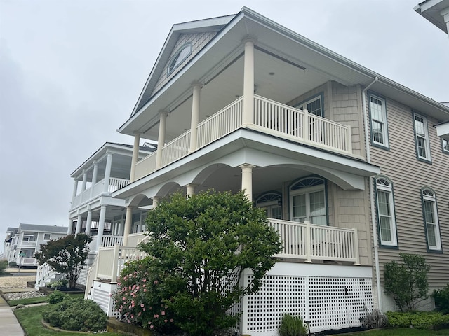5011 Haven Ave Unit 2, Ocean City, NJ 08226 - view of side of home with a balcony and covered porch