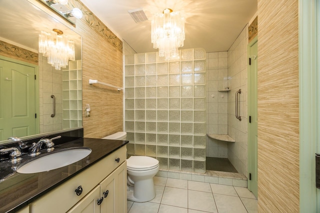 5011 Haven Ave Unit 2, Ocean City, NJ 08226 - full bath with a chandelier, tile patterned flooring, a shower stall, vanity, and toilet