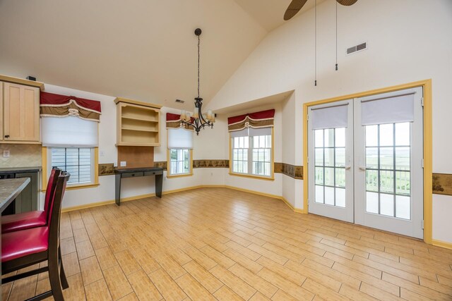 5011 Haven Ave Unit 2, Ocean City, NJ 08226 - kitchen featuring a chandelier, dark countertops, light wood-style flooring, open shelves, and high vaulted ceiling