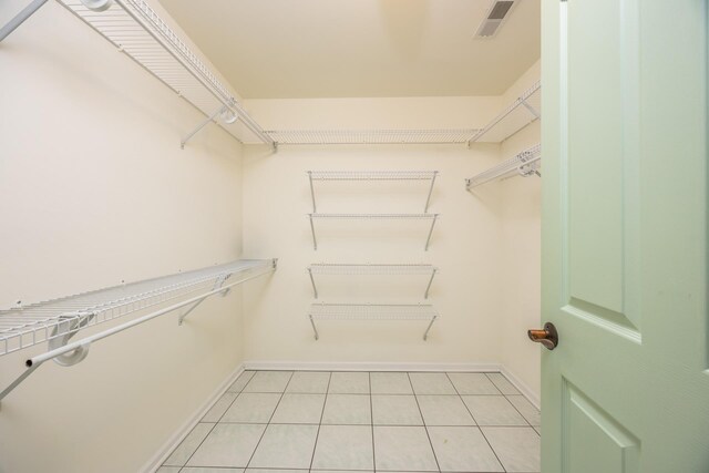 5011 Haven Ave Unit 2, Ocean City, NJ 08226 - walk in closet with light tile patterned floors