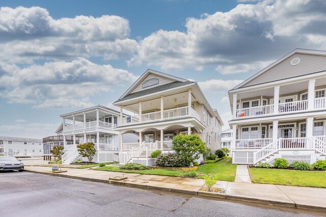 5011 Haven Ave Unit 2, Ocean City, NJ 08226 - view of front of home with a balcony, stairway, and covered porch