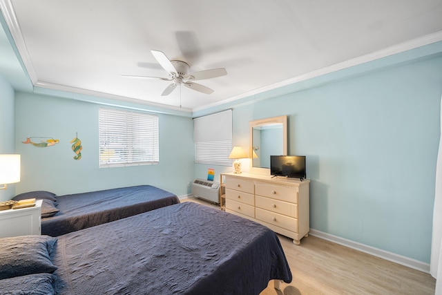 66 E 20th St Unit 108, Avalon, NJ 08202 - bedroom with light wood-style flooring, a ceiling fan, ornamental molding, and an AC wall unit