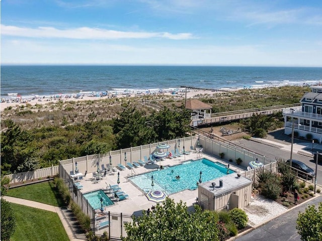 66 E 20th St Unit 108, Avalon, NJ 08202 - bird's eye view of a pool and a large body of water
