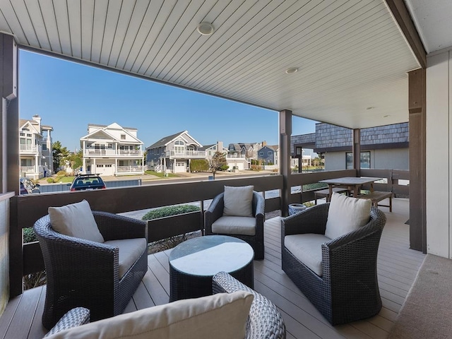 66 E 20th St Unit 108, Avalon, NJ 08202 - wooden terrace with a residential view and an outdoor hangout area