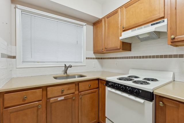 kitchen with sink, backsplash, and white electric stove