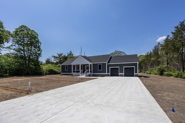 1840 Rt 9th Hwy, Seaville, NJ 08230 - view of front of home featuring an attached garage, driveway, and covered porch