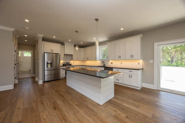 1840 Rt 9th Hwy, Seaville, NJ 08230 - kitchen with stainless steel fridge with ice dispenser, dark countertops, tasteful backsplash, baseboards, and white cabinets