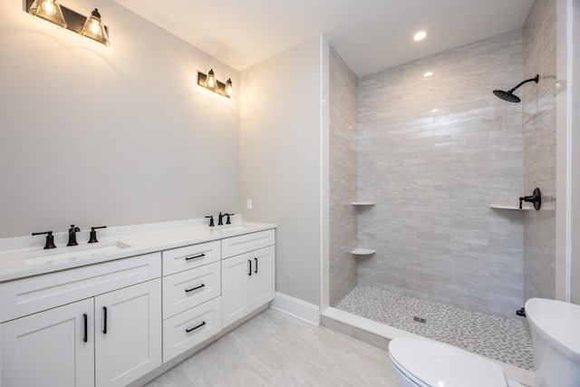 1840 Rt 9th Hwy, Seaville, NJ 08230 - bathroom with a tile shower, double vanity, toilet, baseboards, and marble finish floors