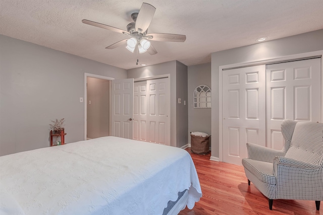 15 Seaview Ave, Beesleys Point, NJ 08223 - bedroom featuring multiple closets, light wood-style floors, a ceiling fan, and recessed lighting