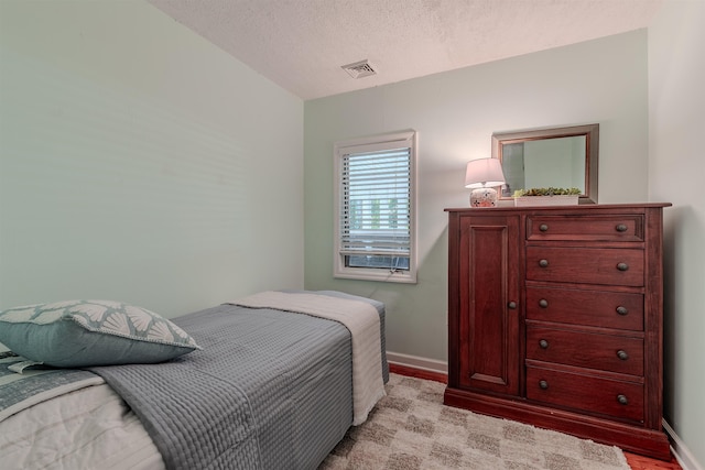 15 Seaview Ave, Beesleys Point, NJ 08223 - bedroom featuring baseboards and a textured ceiling