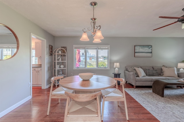 15 Seaview Ave, Beesleys Point, NJ 08223 - dining area featuring plenty of natural light, ceiling fan, wood finished floors, and a chandelier