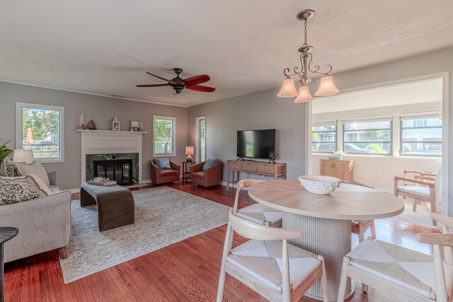 15 Seaview Ave, Beesleys Point, NJ 08223 - living room featuring wood finished floors, a fireplace, and a ceiling fan