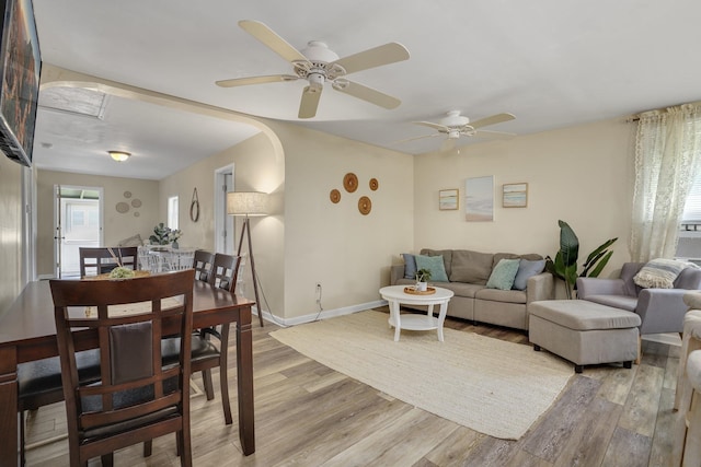 39 E Pacific Ave, Villas, NJ 08251 - living area featuring light wood finished floors, a ceiling fan, and arched walkways