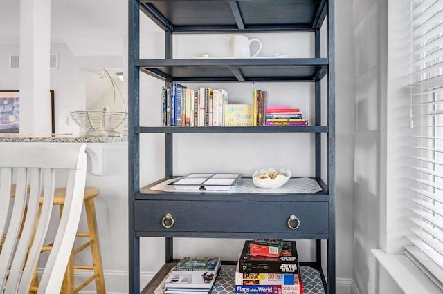 interior details featuring baseboards and visible vents