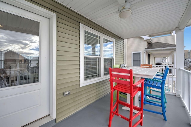 view of patio featuring ceiling fan