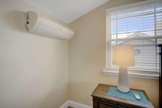 room details with a wall unit AC and baseboards