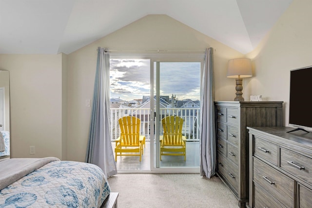 bedroom with lofted ceiling, light carpet, and access to exterior