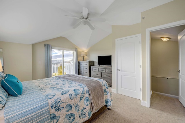 carpeted bedroom featuring a ceiling fan, access to outside, lofted ceiling, and baseboards