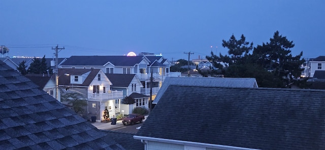 424 W Andrews Ave, Wildwood, NJ 08260 - exterior view of a shingled roof, a downspout, and gutters