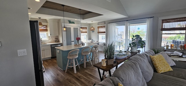 424 W Andrews Ave, Wildwood, NJ 08260 - living room with dark wood finished floors, recessed lighting, and a tray ceiling