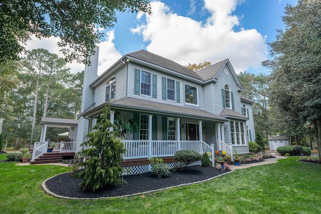 view of front of home featuring a porch and a front lawn