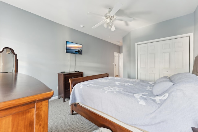 bedroom featuring a closet, ceiling fan, and carpet