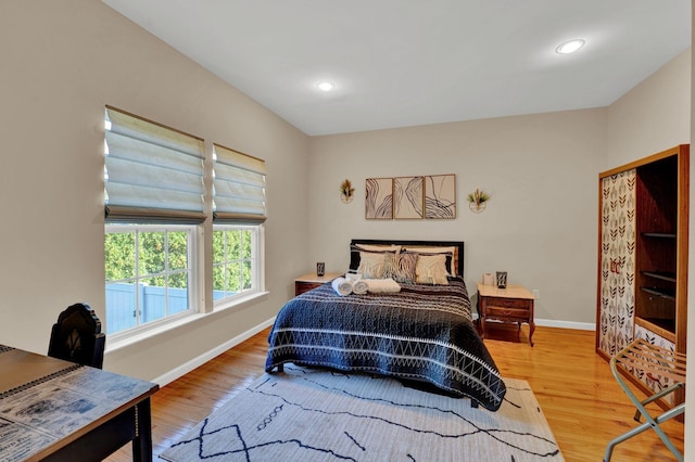 bedroom with wood-type flooring