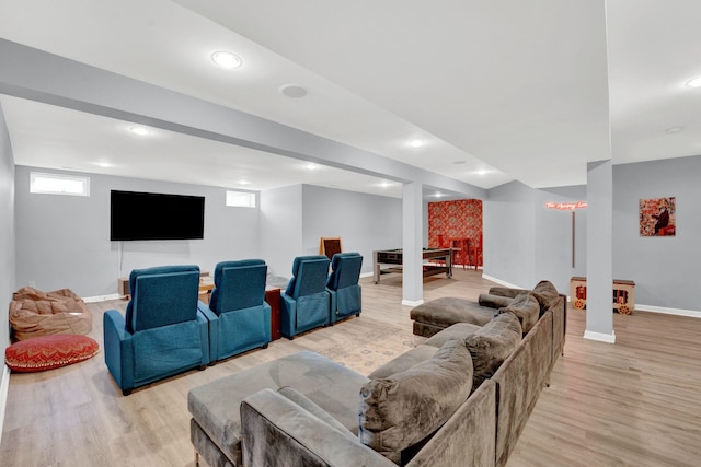 home theater featuring light hardwood / wood-style floors