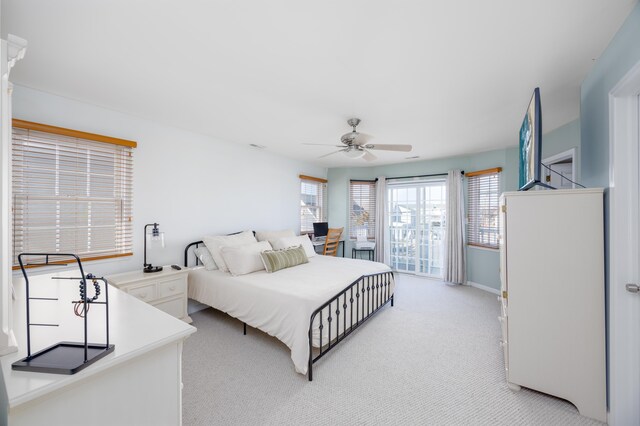 bedroom with light colored carpet and ceiling fan