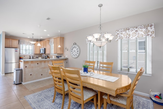 dining room with visible vents, baseboards, light tile patterned flooring, a chandelier, and recessed lighting